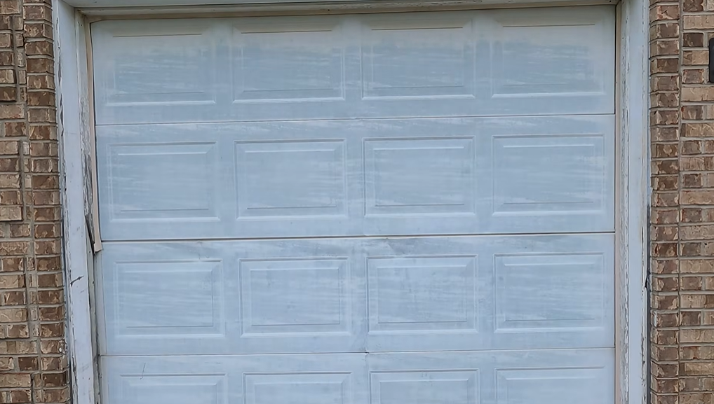 Repaired garage door panel after service